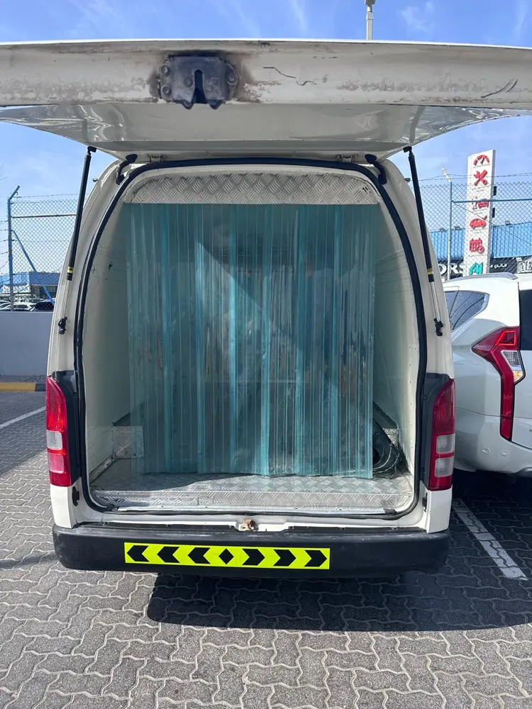 Inside a DegreeZero chiller van: aluminium chequer floor and strip curtains